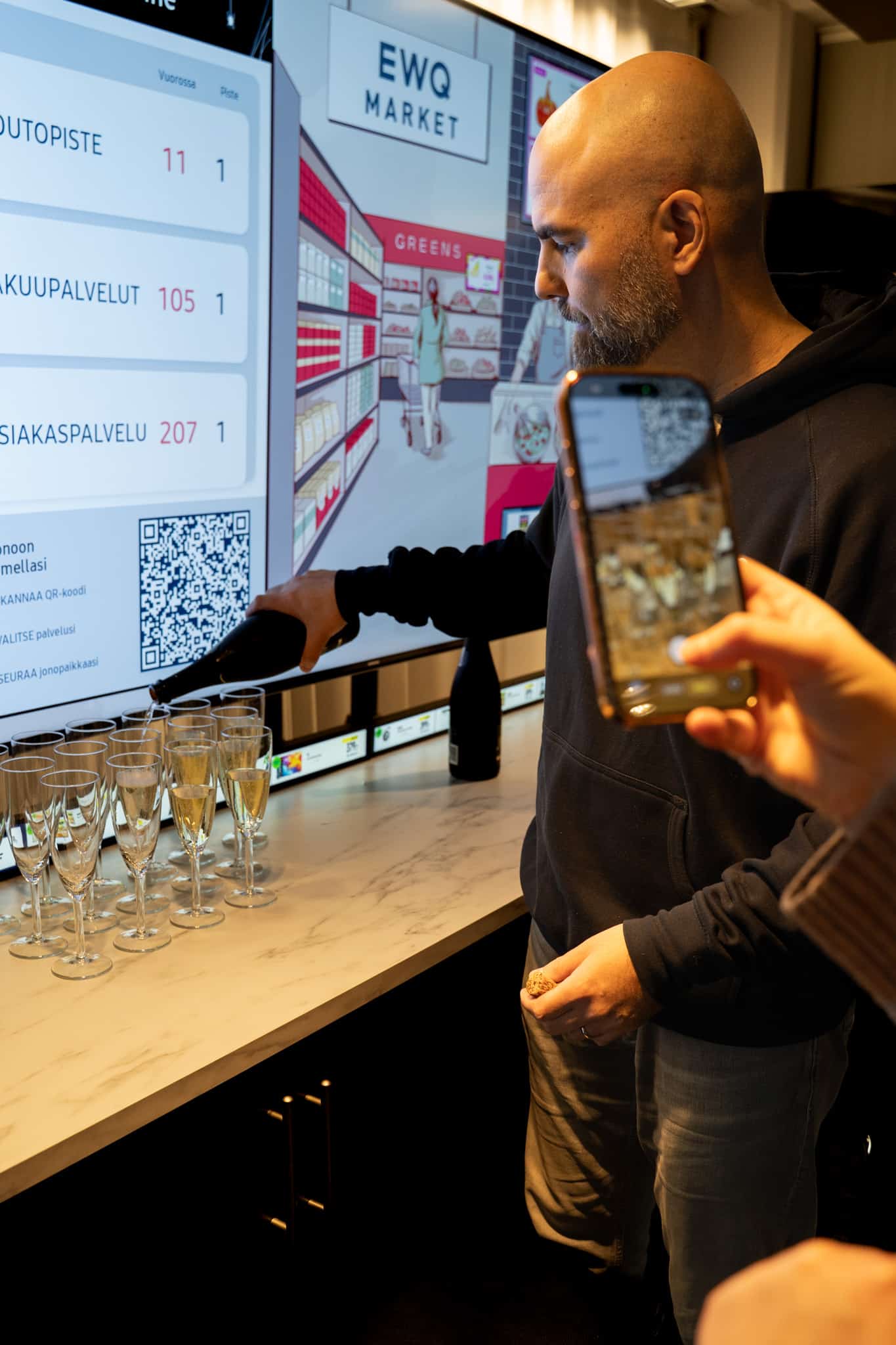 ouring some sparkling drink into a glass