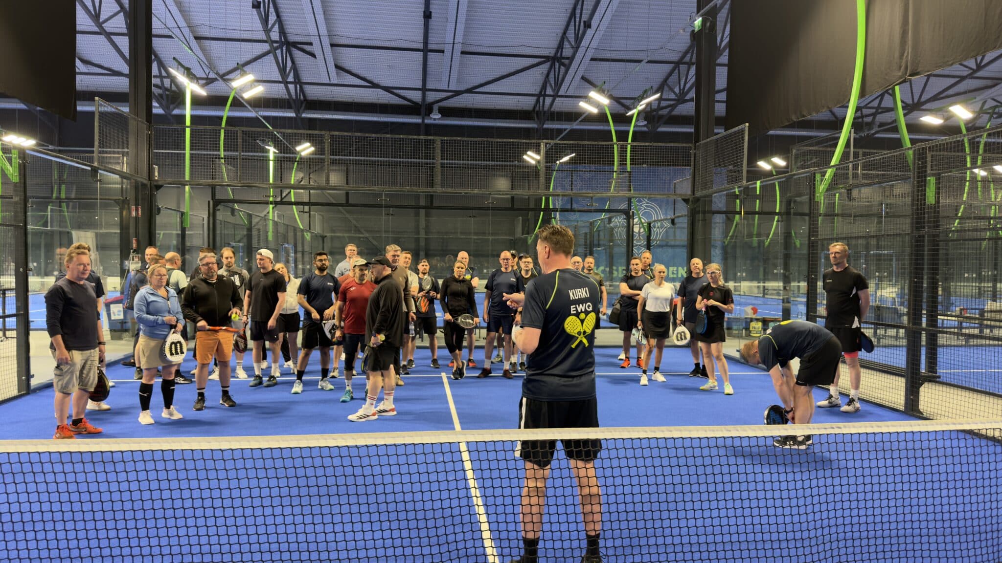 Participants at the EWQ Padel Tournament during the 30th Anniversary Celebration